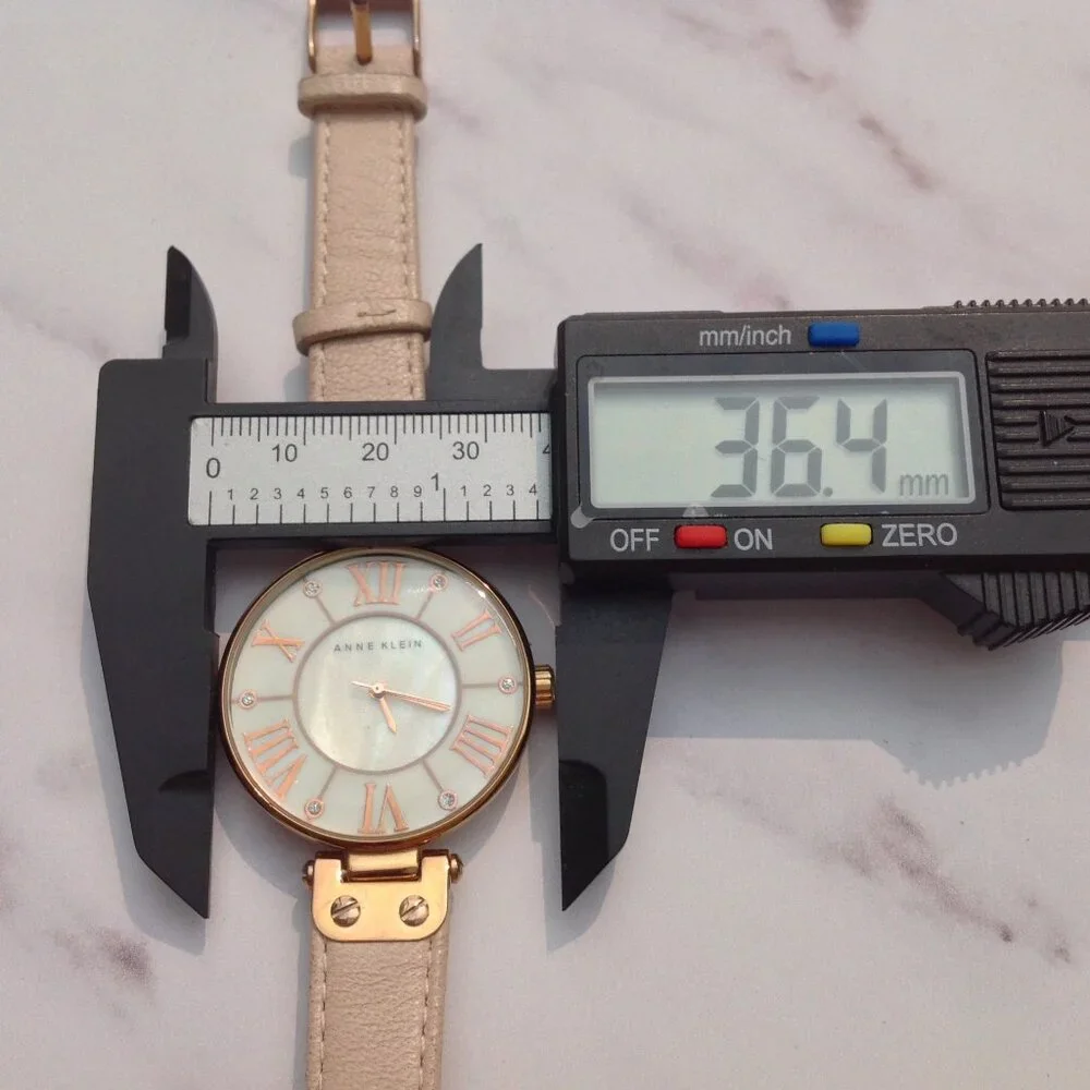 Anne Klein Quartz Wrist Watch MOP Face and Rose Gold & Arabic Numerals